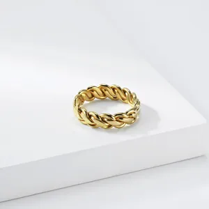 Gold braided chain ring for women and men, minimalist titanium steel fashion jewelry.