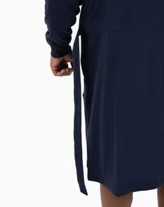 Solid color long sleeve hooded bathrobe detail showing side belt and soft texture fabric fit.