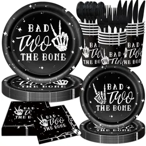 Black skeleton hand party tableware set including paper plates, cups, napkins, and cutlery.