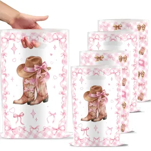 Detailansicht der rosa Western Cowboy Stiefel Geschenktüten mit niedlichen Schleifen.
