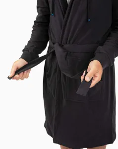 Black hooded bathrobe detail showing adjustable waist belt and deep pockets for comfort.