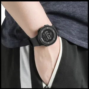 Close-up shot of the black digital sports watch worn on wrist showing clear display.