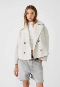Detailed view of the European style short double-breasted wool blend blazer jacket in light grey.