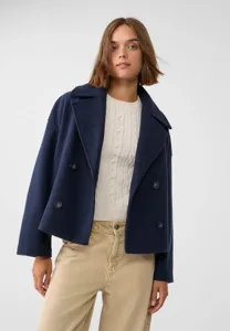 Detailed view of the women's navy blue double breasted short wool coat with lapel.