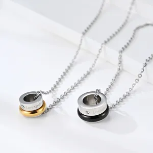 Collier pendentif de couple en acier inoxydable rotatif à double anneau de style coréen