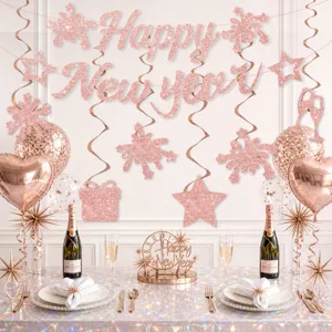 Rose gold glitter Happy New Year banner and hanging swirls party celebration decor set.