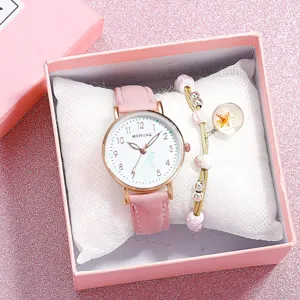 Pink leather strap quartz watch and floral bracelet set detail view, elegant student style timepiece.