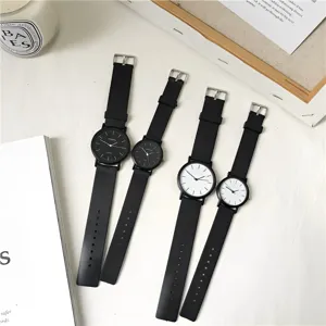 Montre à quartz de couple noir et blanc style ins minimaliste pour étudiants casual.