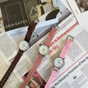 Canvas strap quartz watch for students, simple casual design, thin dial, stylish everyday.
