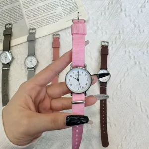Minimalist quartz watch with durable nylon strap, casual student style for daily wear.