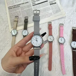 Fashionable simple casual quartz watch with nylon canvas strap for student daily wear.