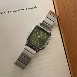 Women's minimalist square quartz watch with green dial and silver metal strap elegant accessory