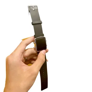 Stylish black digital wristwatch with silver square case and comfortable silicone strap.