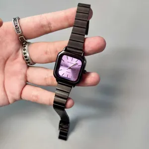 Black square quartz watch for women featuring a purple dial and metal bracelet detail