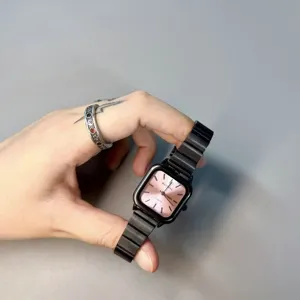 Niche design black square women quartz watch with elegant pink dial and stylish steel strap.