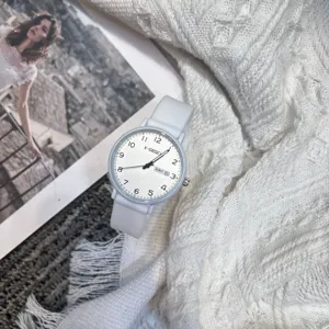 Minimalist student quartz watch for exams, white silicone strap, clear dial with numbers.