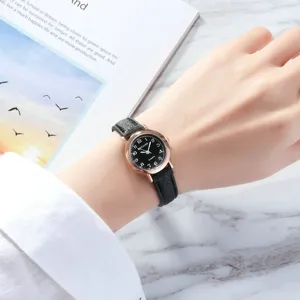 Elegant women quartz watch with black small dial and leather strap for daily wear style.