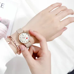 Chic minimalist nylon strap quartz watch for girls with matching roman numeral bracelet detail.