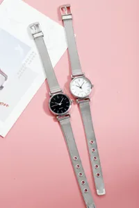 Minimalist women quartz watch set with silver mesh strap, elegant casual timepiece daily wear.