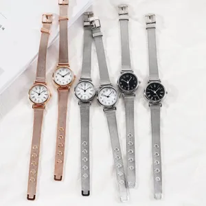 Minimalist women quartz watch set with stylish mesh stainless steel strap and round dial.