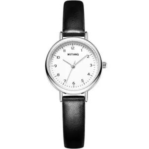 Minimalist women's quartz watch featuring a black leather strap and small round dial.