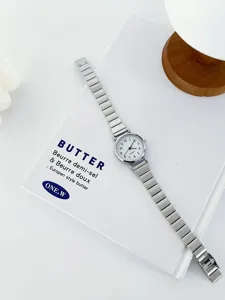 Minimalist women quartz watch with silver metal strap and clean dial detail shot for daily wear.