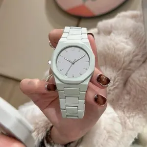Minimalist octagonal quartz watch with resin strap, stylish daily wear accessory detail view.