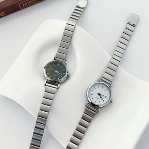 Minimalist womens quartz watch with metal strap, elegant retro style daily wristwatch for ladies.