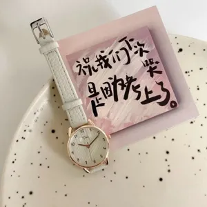 Minimalist women quartz watch with white leather strap and rose gold bezel, ins style daily wear.