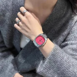 Women quartz square watch with vibrant pink dial and silver steel strap, stylish daily wear.