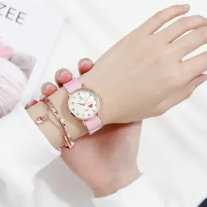 Detailed close-up of girls pink nylon strap quartz watch with matching rose gold Roman bangle.