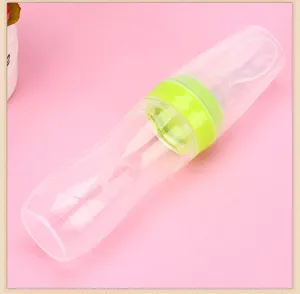 Silicone baby food dispensing spoon bottle, squeeze rice cereal feeder for infants and toddlers.