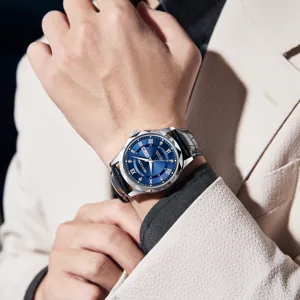 Luxury quartz men's watch featuring a striking blue dial, geometric bezel and black leather strap.