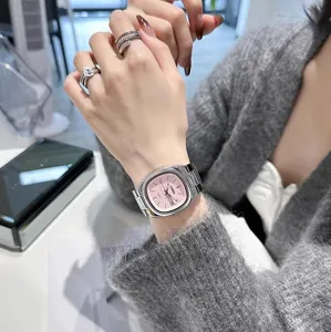 Elegant women's square quartz watch with pink dial and metal strap, minimalist daily style.