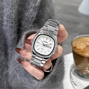 Minimalist square quartz women watch with steel strap and calendar display for daily wear