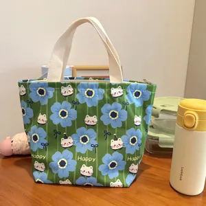 Bonita bolsa de lona estampada de dibujos animados con flores azules y lindo gato.