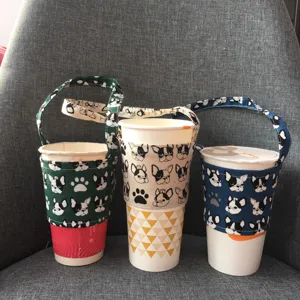 Fodera per tazza in tessuto riutilizzabile con manico, simpatico motivo bulldog francese.