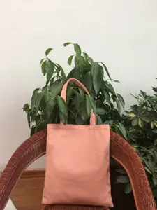 Bolso tote de lona rosa bolso de hombro informal minimalista para el trabajo diario y estudiantes.