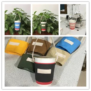 Detailansicht der Leinen-Becherhülle, robustes Stoffmaterial, tragbarer Henkel, viele Farben.