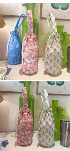 Borsa per bottiglia d'acqua trapuntata stampata, custodia portatile per tazza termica con coulisse.