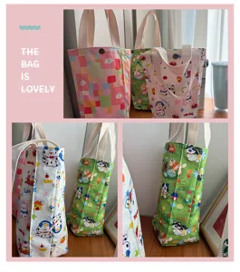 Cute waterproof cartoon lunch bag, portable canvas tote for outdoor travel, durable utility storage.