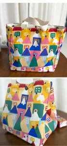 Bolsa de almuerzo de lona con estampado de casa de dibujos animados, vista detallada.