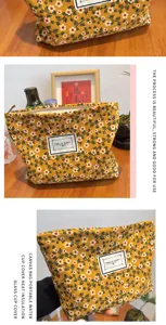 Trousse de maquillage en velours côtelé floral jaune pochette de toilette zippée.