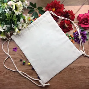 DIY blank canvas drawstring backpack detail view, natural cotton favor bag for paint.