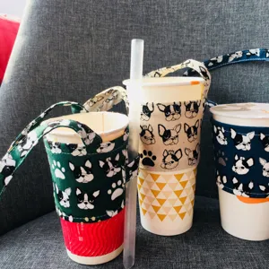 Fodera per tazza in tessuto con simpatico motivo di cane, cinghia portatile per caffè.