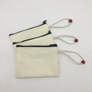 Blank canvas zipper pouch with red bead cord, ideal for DIY painting, coin purse and pencil case.