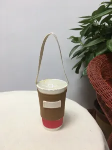 Handgemachte braune Canvas Tassenhülle mit langem Tragegurt für Getränke und Kaffeebecher.
