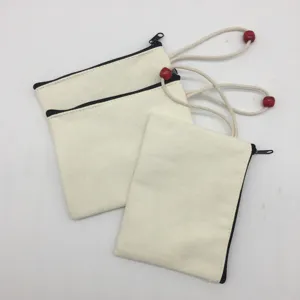 Blank canvas zipper pouch DIY makeup bag coin purse with red wooden beads and black zipper.