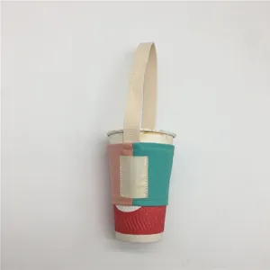 Farbblockierter Milchtee-Becherhalter, stilvolle Leinwand-Getränke-Hülle mit Griff.