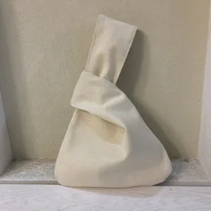 Japanischer Canvas Knoten Handgelenkbeutel, minimalistische Freizeittasche für Alltag.